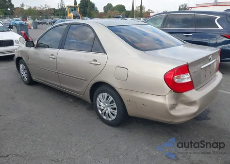 2004 Toyota Camry Le z USA, uszkodzony, nr VIN 4T1BE32K94U854215